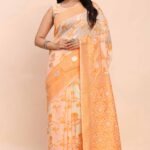 Orange Floral Linen Cotton Saree Accented With Zari Weaving & Tassel Pallu Elegance