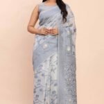 Grey Floral Linen Cotton Saree Accented With Zari Weaving & Tassel Pallu Elegance