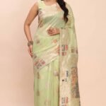 Light Green Bloom Zari Woven Linen Cotton Saree Adorned With Floral Motifs & A Tassel Finish
