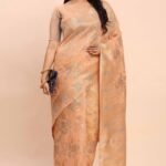 Light Orange Linen Cotton Saree Showcasing Floral Zari Weaves & A Tasselled Finish Pallu