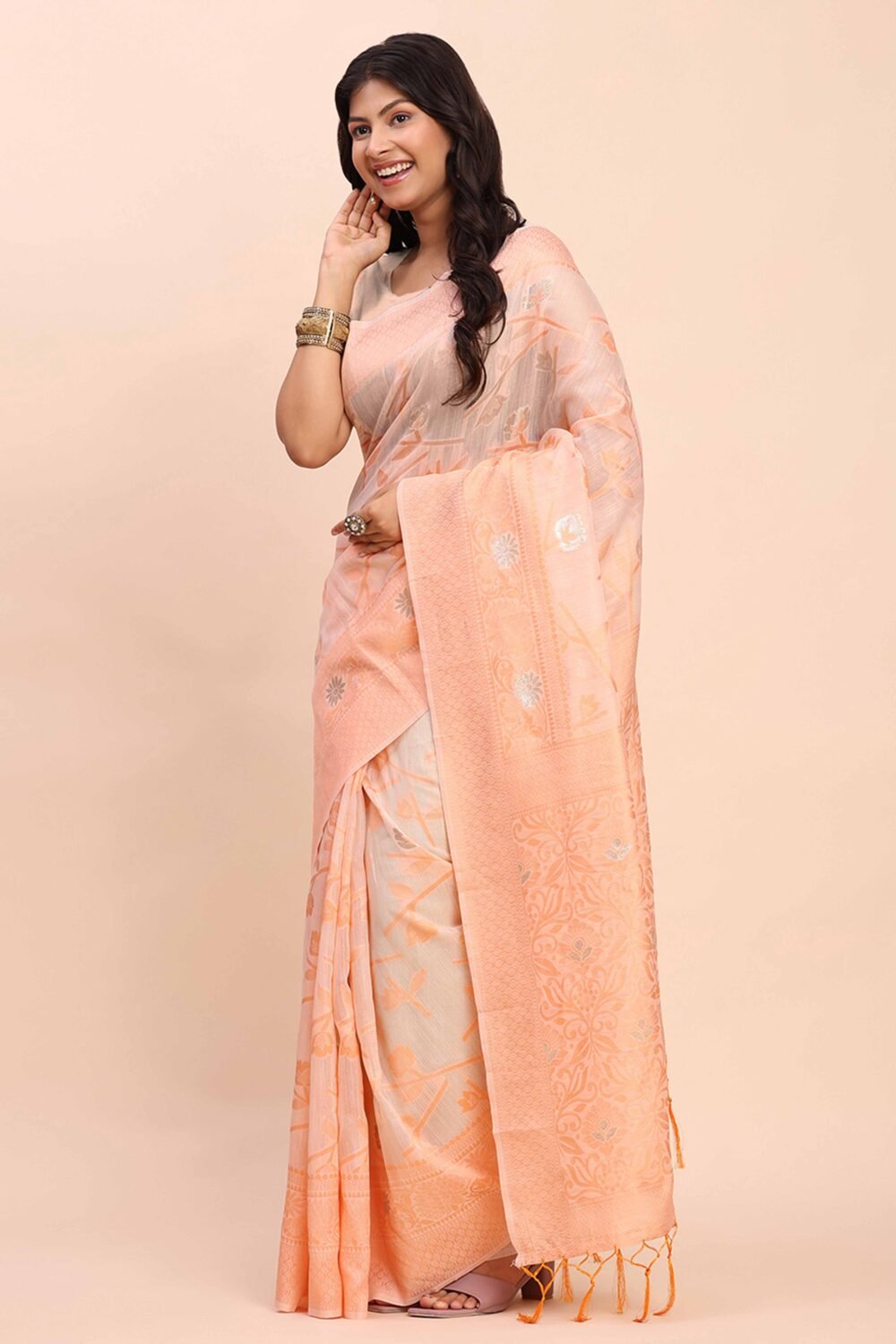 Peach Floral Linen Cotton Saree Accented With Zari Weaving & Tassel Pallu Elegance - Image 3