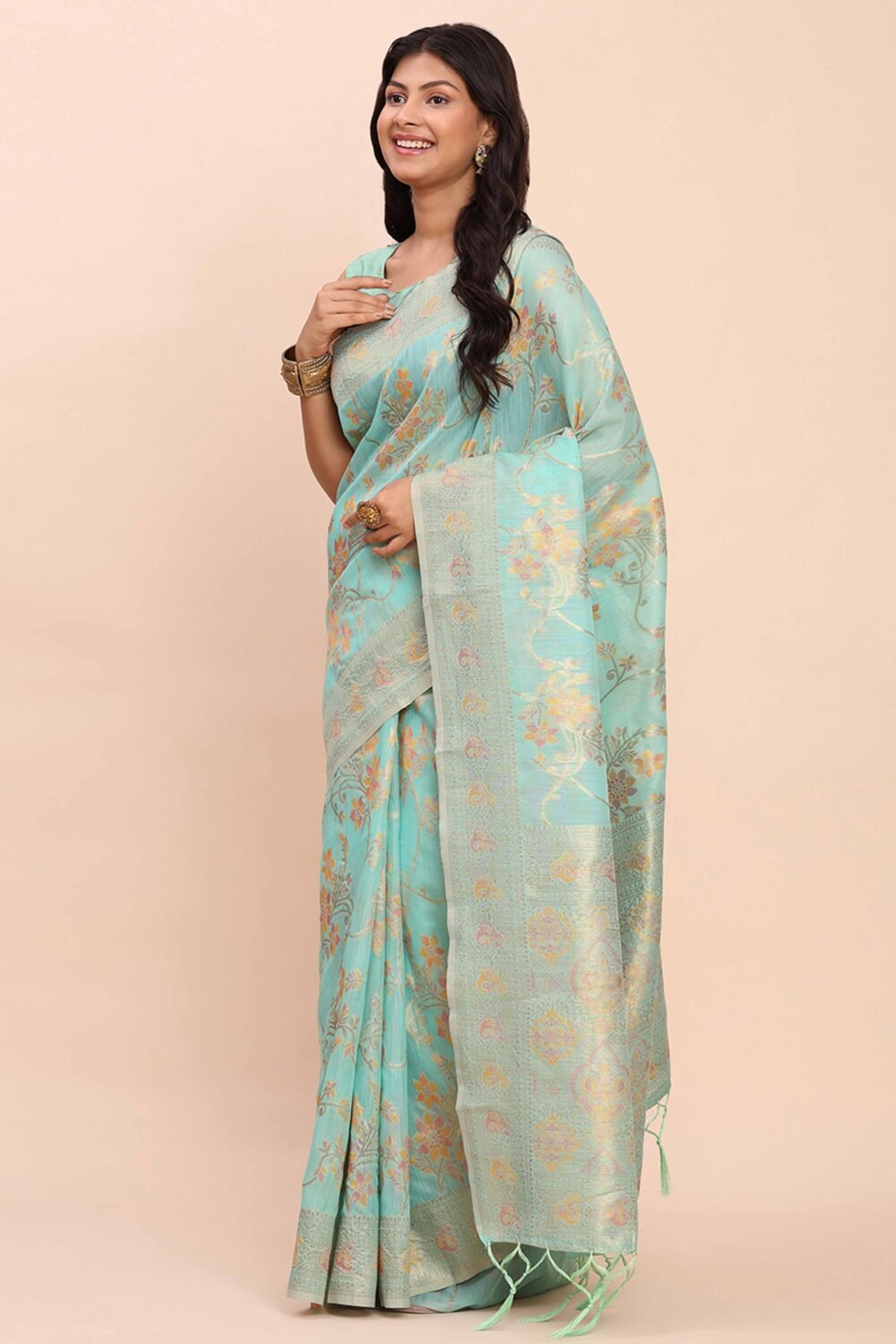 Turquoise Linen Cotton Saree Showcasing Floral Zari Weaves & A Tasselled Finish Pallu - Image 3