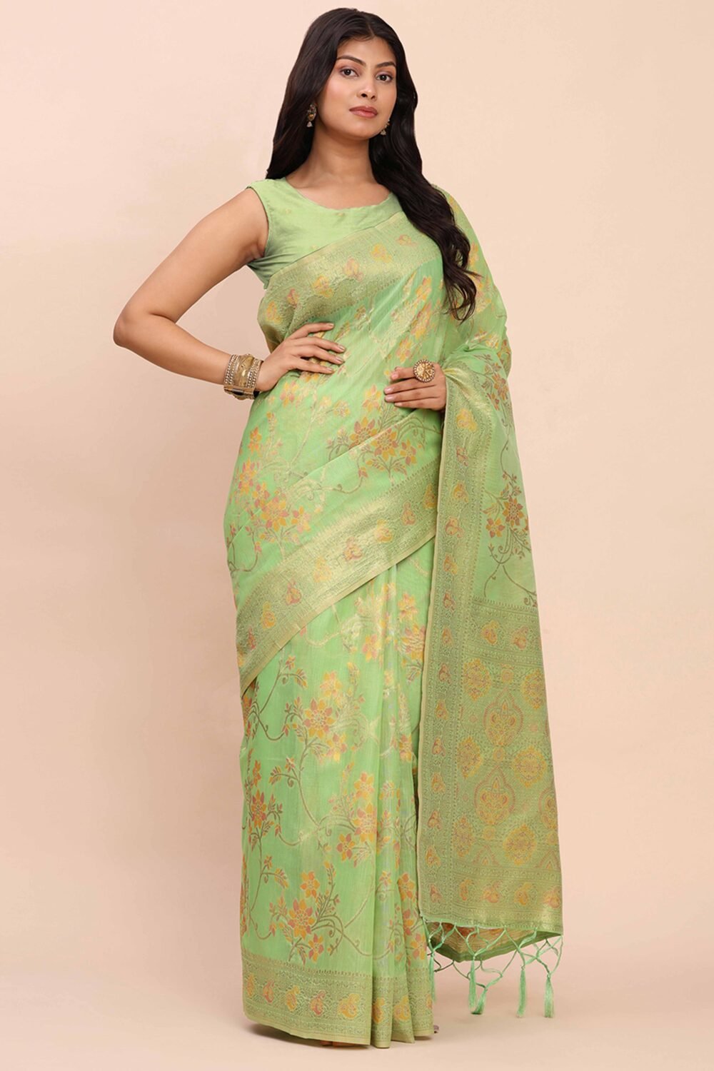 Green Linen Cotton Saree Showcasing Floral Zari Weaves & A Tasselled Finish Pallu - Image 4