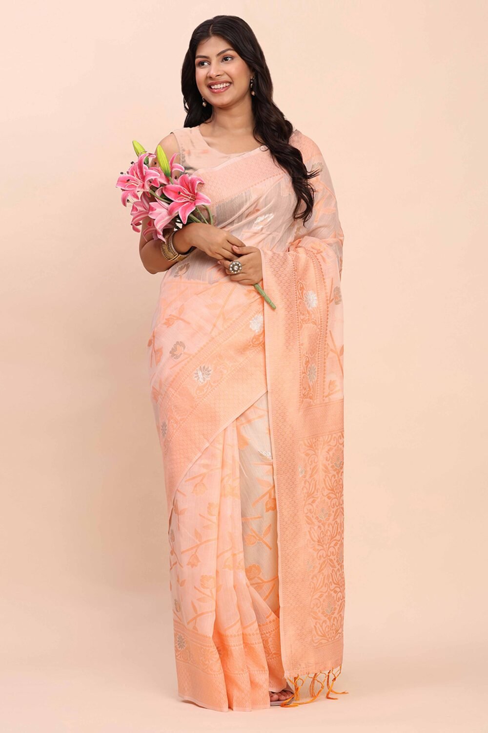 Peach Floral Linen Cotton Saree Accented With Zari Weaving & Tassel Pallu Elegance - Image 5
