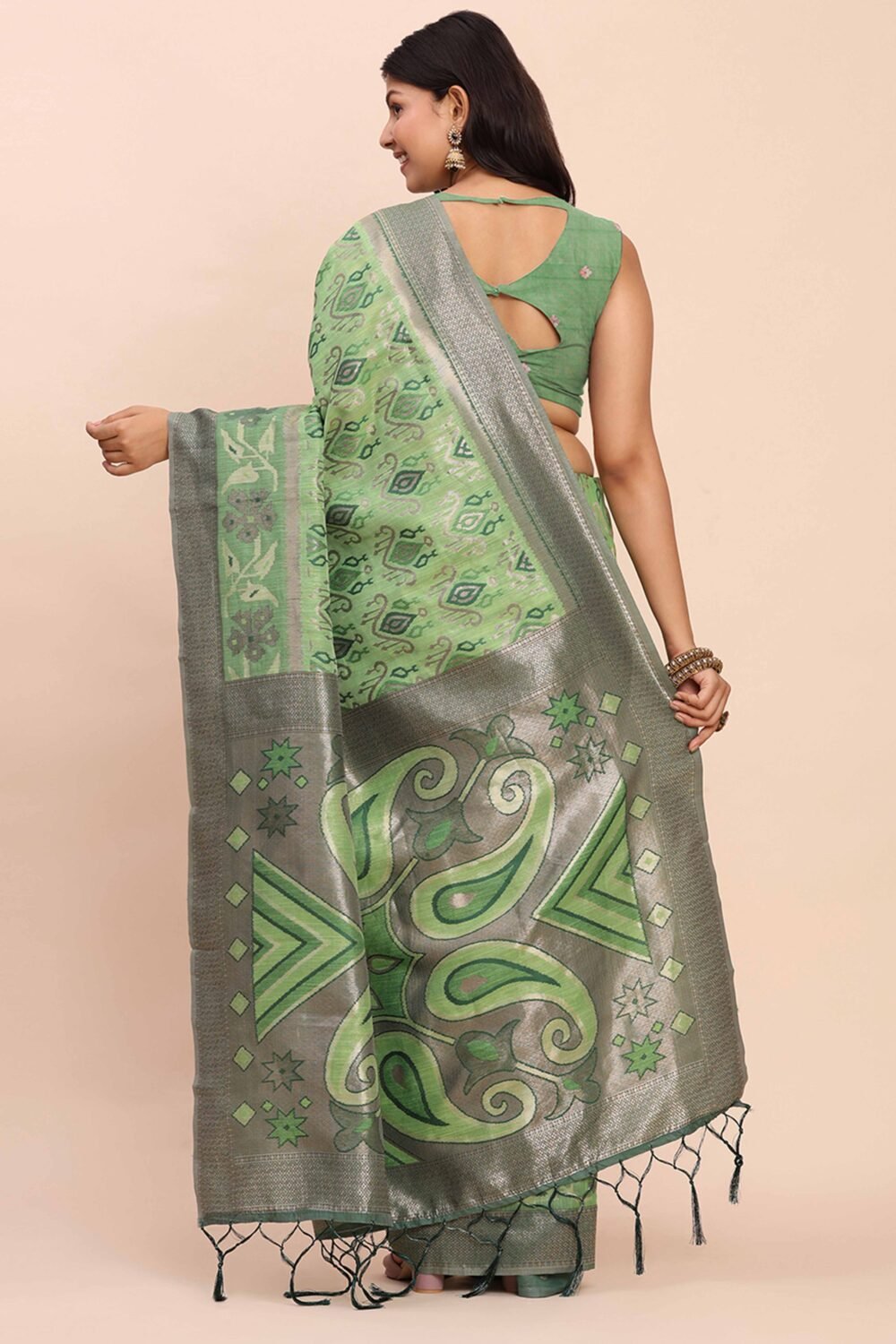 Green Patola Inspired Linen Cotton Saree Adorned With Zari Weaving & Graceful Tassel Pallu - Image 5