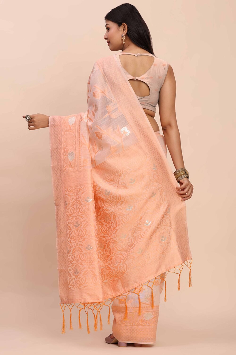 Peach Floral Linen Cotton Saree Accented With Zari Weaving & Tassel Pallu Elegance - Image 6