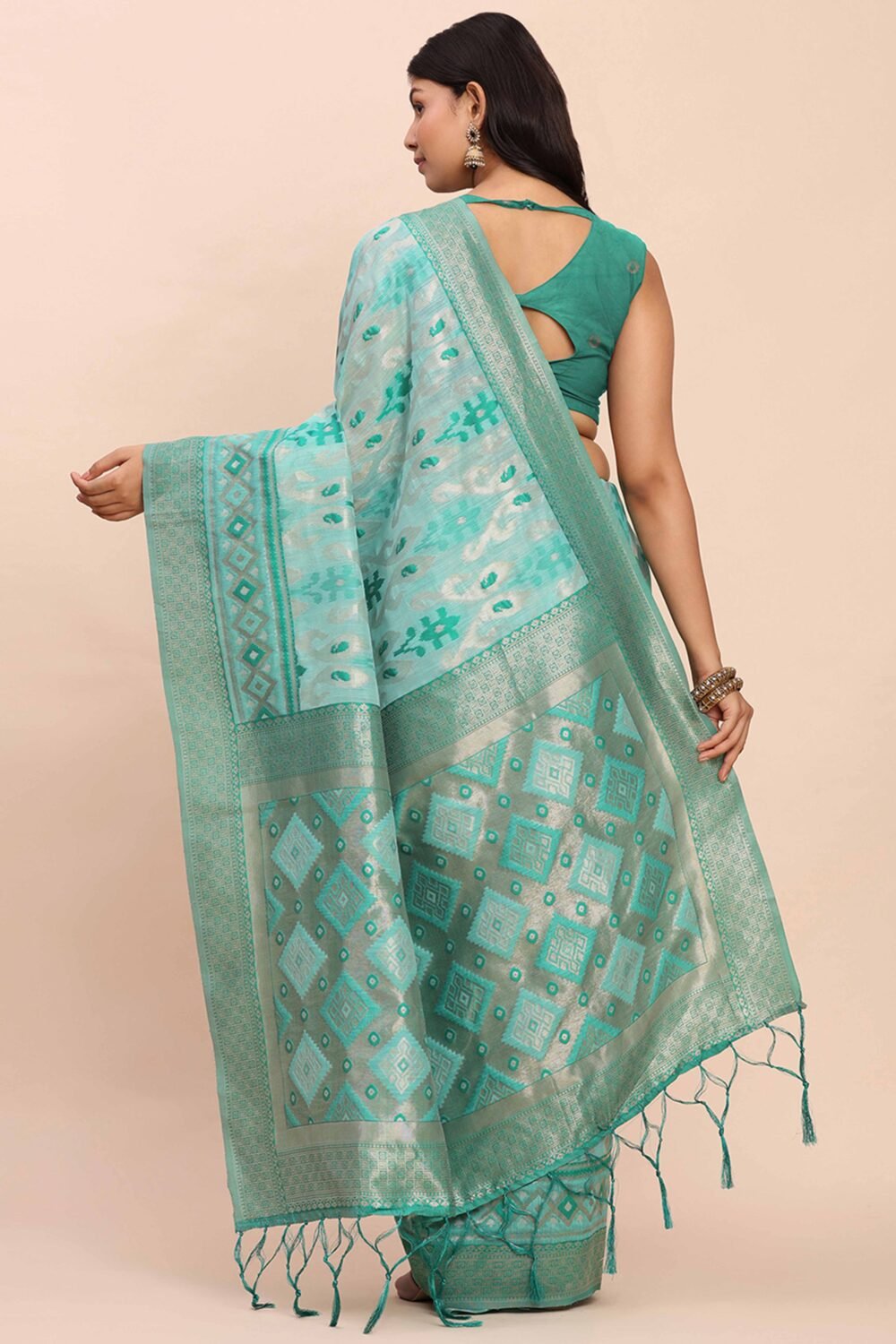 Turquoise Patola Inspired Linen Cotton Saree Adorned With Zari Weaving & Graceful Tassel Pallu - Image 6