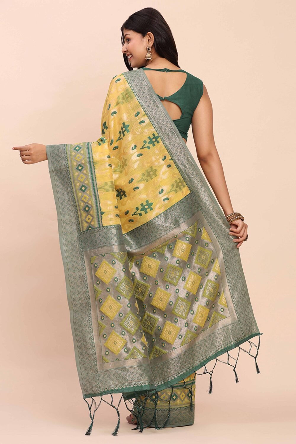 Yellow Patola Inspired Linen Cotton Saree Adorned With Zari Weaving & Graceful Tassel Pallu - Image 6